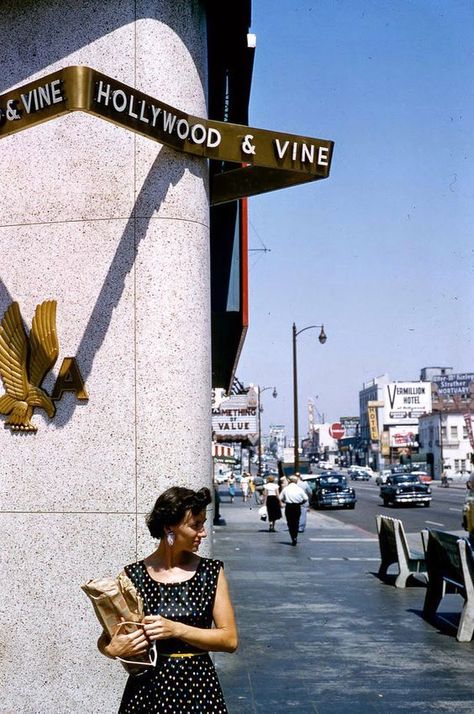 I’m wondering if this woman waiting on the corner of Hollywood and Vine had just booked a ticket at the American Airlines office that opened in 1955. MGM’s “Something of Value" starring Rock Hudson and Sidney Poitier at the Pantages Theatre came out in June of 1957. The corner now has a different sign alerting passersby that they’re at Hollywood and Vine, and it’s nice but there’s something classy and timeless about that golden ribbon above the woman’s head that I wish was still there. Hollywood And Vine, Hollywood Street, Ca History, Los Angeles Hollywood, California History, Vintage Los Angeles, Vintage California, City Of Angels, Los Angeles Area