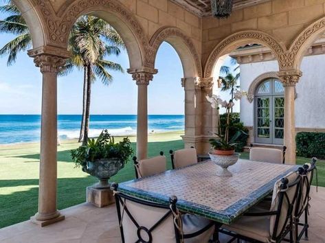 Mediterranean Porch, Beach Mansions, Carved Stone Fireplace, New York Townhouse, Stone Archway, Beach Mansion, Luxury Swimming Pools, Fisher Island, Mediterranean Architecture