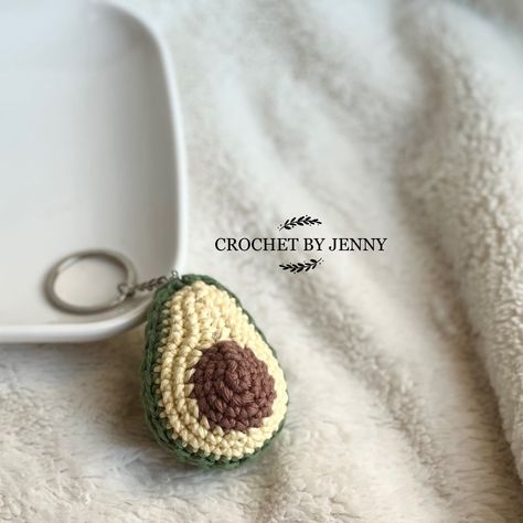 Avocado Keychains are handmade crochet plushies that make cute and unique accessories. They are perfect for🥑 lovers of all.#crochetkeychain #handmadegifts #DIYkeychain #crochetlove #keychainaddict Crochet Avocado Keychain, Cute Crochet Charms, Cute Keychain Crochet, Knitting Keychain, Avocado Crochet, Crochet Avocado, Crochet Charms, Avocado Keychain, Cute Keychains