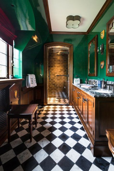 Black and white tiles and a green wall creates a rich, elegant bathroom. Designed by Rinfret, LTD. Black And White Bathroom Floor, Black Tile Bathrooms, Bathroom Downstairs, Bathroom Green, Black White Bathrooms, Casa Country, Bad Inspiration, Downstairs Bathroom, Green Bathroom