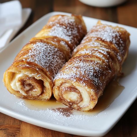 🍞 "Cinnamon Roll meets French Toast in this irresistible breakfast treat!" 🥞🍯 #BreakfastGoals #SweetMornings Cinnamon Roll French Toast Roll-Ups Ingredients: Slices of bread (8) Cream cheese, softened (4 oz) Powdered sugar (2 tbsp) Ground cinnamon (1 tsp) Egg (1) Milk (¼ cup) Butter (for cooking) Sugar (¼ cup) Ground cinnamon (1 tsp) Maple syrup (for serving) Instructions: Trim crusts from bread and flatten with a rolling pin. Mix cream cheese, powdered sugar, and 1 tsp cinnamon; spread o... French Cinnamon Rolls, Cinnamon Spread, Stuffed French Toast Cream Cheese, Cinnamon Roll French, French Toast Roll Ups, Cinnamon Roll French Toast, Cream Cheese Bread, Instagram Recipes, Cinnamon Raisin