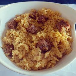 A locrio is a rice dish from the Dominican Republic. Similar to pilaf and paella, it consists of seasoned rice with some kind of meat, such as chicken, Dominican salami or pork, but no beef. Longaniza is a Spanish sausage similar to chorizo. Next time you want to add a tasty sausage to your dish, consider trying some longaniza. The spices it is prepared with gives any dish a zesty flavor. Dominican Rice, Rice With Sausage, Dominican Dish, Pork But, Spanish Sausage, Rice Dish, Seasoned Rice, The Dominican Republic, Rice Dishes