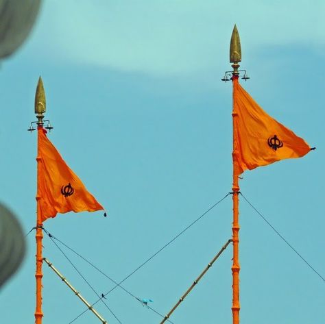 Sikh flag,often referred as 'Nishan Sahib' signify 'Miri'(Temporal or worldly) and 'Piri'(Spiritual) authority.Shape is pointed triangular depicts dynamism,yellow signify optimism,revolution. Nishan Sahib Wallpaper, Nishan Sahib, Nihang Singh, Temple Wallpaper, India Fashion Men, Golden Temple Wallpaper, Nanak Jayanti, Advert Design, Spiritual Authority