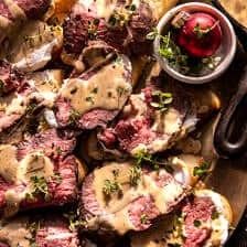 Beef Tenderloin Crostini with Parmesan Wine Cream Sauce - Half Baked Harvest Beef Tenderloin Crostini With Parmesan Cream Sauce, Beef Tenderloin Crostini, Tenderloin Crostini, Wine Cream Sauce, White Wine Cream Sauce, Toasted Crostini, Beef Tenderloin Roast, Crostini Appetizers, Whipped Goat Cheese