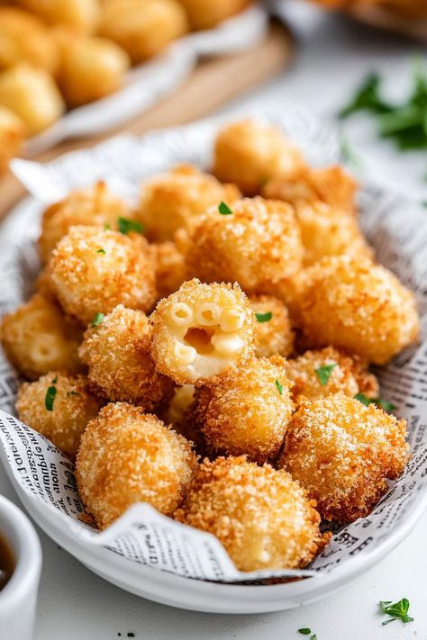 Crispy on the outside and ooey-gooey on the inside, these mac and cheese bites are the ultimate comforting snack or crowd-pleasing party appetizer. Mac And Cheese Fingerfood, Fried Mac And Cheese Bites, Fried Mac N Cheese Balls, Mac N Cheese Bites, Fried Mac And Cheese, Mac And Cheese Bites, Making Mac And Cheese, Fried Foods, Small Pasta