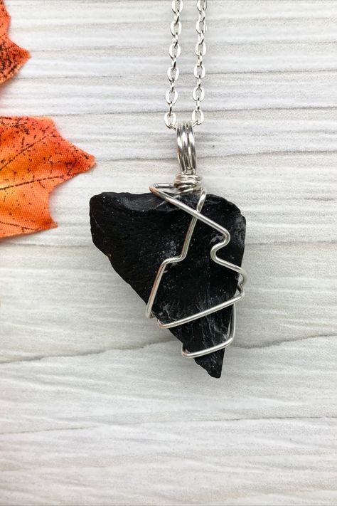 Black Onyx Necklace. Raw Black Onyx crystal hand wrapped with .925 Sterling Silver Wire. Comes on a silver plated 18 or 20 inch lobster clasp necklace. You get the exact pendant pictured. #blackonyx #onyx #pendant #necklace #jewelry #spiritual #witch #pagan #metaphysical #newage #silverjewelry #etsy #crystals #rawcrystal #blackcrystal #blackstone #capricornjewelry #leojewelry Black Rock Necklace, Black Crystal Jewelry, Sam Core, Capricorn Jewelry, Spiritual Witch, Leo Jewelry, Etsy Crystals, Black Onyx Crystal, Jewelry Spiritual