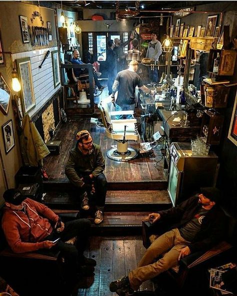 What a cool barber shop interior & relaxed vibe. Anyone know the name of this place or where it's located? Please comment if so. Can't quite make out the lettered signage on the wall at top left. Barber Shop Ideas, Tattoo Shop Interior, Tattoo Studio Interior, Barber Shop Interior, Barbershop Design, Barber Shop Decor, Tattoo Old School, Salon Suites, Studio Interior