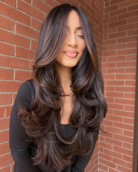 Top 10 autumn winter hair trends for 2023-2024 Brown Babylights On Black Hair, Chocolate Brown Hair With Long Layers, Voluminous Curls Medium Length, Chocolate Brown Balayage Curly Hair, Dark Chocolate Balayage Black Hair, Espresso Highlights On Dark Hair, Chocolate Brunette Balayage, Dramatic Layers Long Hair, Dimensional Black Hair