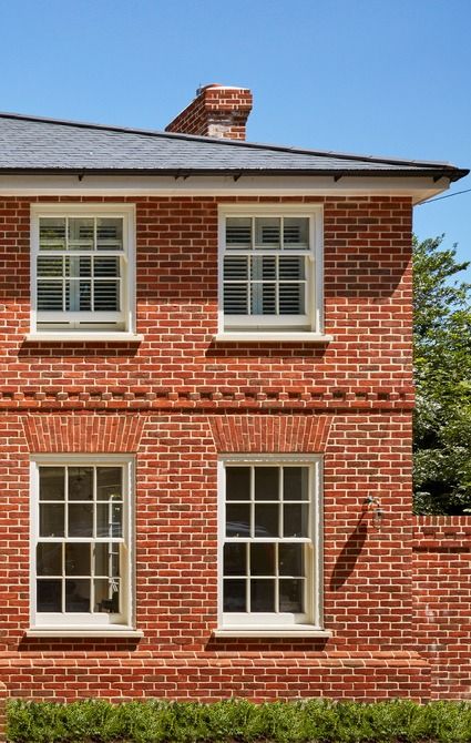 This elegant new build property has a distinct Georgian aesthetic, so spring balanced sash windows were the ideal choice White Windows Exterior, Georgian Aesthetic, Brick Exterior Makeover, Bay Window Exterior, Front Extension, Wooden Sash Windows, Red Windows, Red Brick House Exterior, Georgian Houses