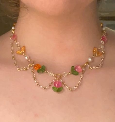 Persephone’s tulips choker (adjustable) $35.00 Now available 🌷 #tulip #tulips #gemstones #gemstonejewelry #literature #dragons #dragon #greekmythology #beadsjewelry #cottagecore #fairycore #smallbusiness #smallbusinessowner #smallbusinesssupport #flowers #flower #flowerjewellery #pink #pinkpinkpink #sunset Tulip Beads, Estilo Coquette, Fairycore Jewelry, Diy Hair Bows, Ethereal Beauty, Girly Jewelry, Fairy Core, Flower Jewellery, Jewellery Making