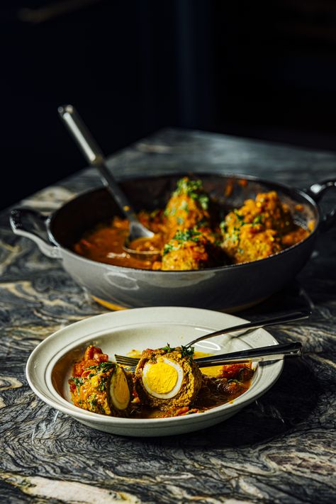 Nargisi Koftas | Indian At Home | Nik Sharma Cooks Nargisi Kofta, February Food, Lamb Koftas, Oval Dining Table, Ground Lamb, Ground Turmeric, Food Favorites, Fenugreek Seeds, Oval Table Dining