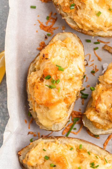 This delicious seafood baked potato recipe has such a fun twist! Baked potatoes are loaded with an irresistible Cajun seasoned creamy mixture with shrimp and crab meat, then topped with melted cheese. Once you've tried this recipe, you'll want to make it again and again! Seafood Baked Potato, Stuffed Recipes, Baked Potato Recipe, Baked Potato Skins, Stuffed Potatoes, Stuffed Baked Potatoes, Seafood Bake, Potato Skin, Sauteed Shrimp