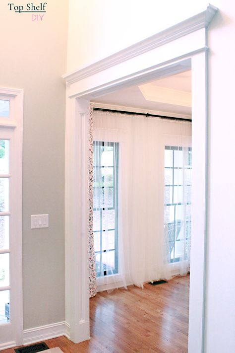 Find out how to beef up your existing doorway trim to create the illusion of wider doorway casing. Follow the step-by-step process here! #doorwaytrimdiy #Doorwaytrimideas #Doorwaytrimdoorcasing #Doorwaytrimdiy #Doorwaytrimfarmhouse #craftsmantrim Farmhouse Doorway Trim, Door Frame Trim Ideas, Diy Doorway Trim, How To Trim Out A Doorway, Doorway Trim Door Casing, Doorway Moulding Ideas, Doorway Framing Ideas, Colonial Interior Trim, Archway Trim Ideas