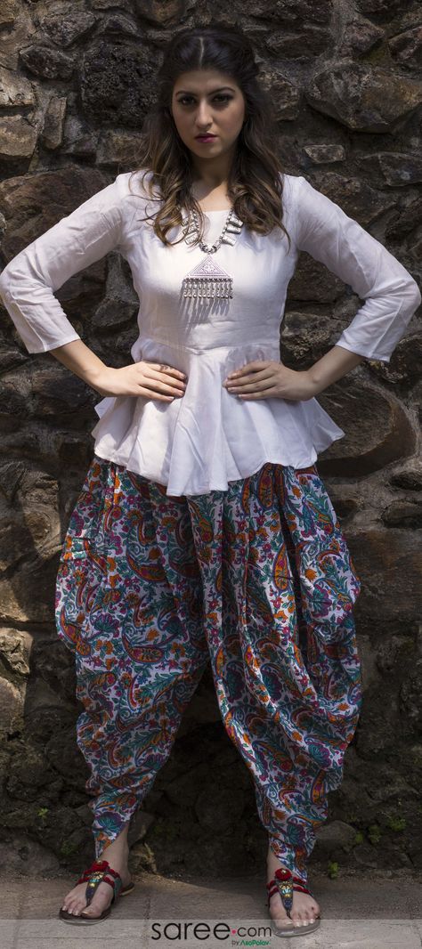 Off white peplum top with printed dhoti Dhoti Pants Outfit Wedding, Dhoti Pants Outfit, Trendy Kurti, White Peplum Top, Kurti For Women, Funky Dresses, Gaun Fashion, Kurti Designs Latest, Dhoti Pants