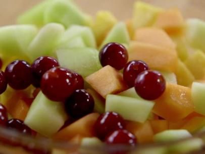 Fruit Salad with Spiced Honey and Thyme Recipe | Ree Drummond | Food Network Honey Salad, Honey Balsamic Dressing, Summer Side Dishes Recipes, Best Salads Ever, Grilled Peach Salad, Spiced Honey, Thyme Recipes, Honey Balsamic, Peach Salad