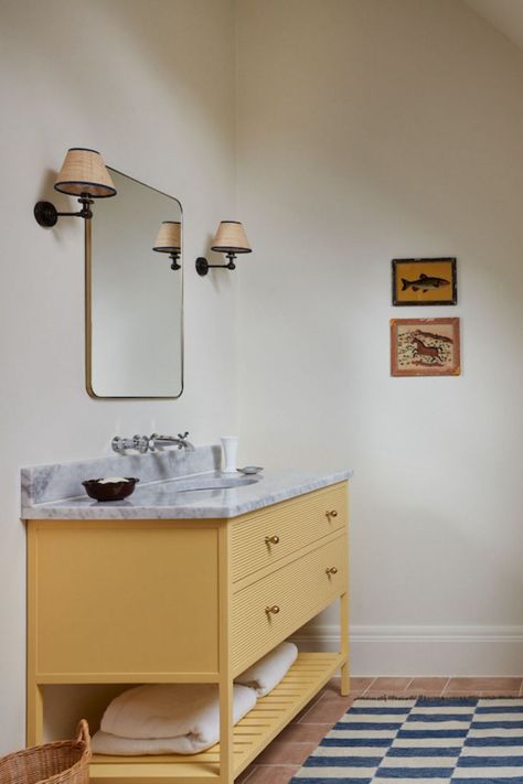 Yellow vanity of dreams! When it comes to cottage decor, embracing warm and inviting colors can transform your space into a cozy retreat. One such color that radiates joy and positivity is yellow. If you're considering infusing a touch of sunshine into your cottage, here's a guide on how to use the vibrant yellow hue, especially on furniture and cabinetry. Image credit: Vaughan Design and Development Yellow Vanity, Front Porch Inspiration, Inviting Colors, Latest Colour, Decorating Blogs, Kids' Bathroom, Easy Diy Projects, Cottage Decor, Color Trends