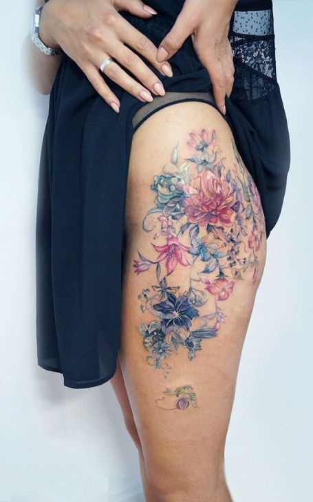 20 Hip Tattoos You Are Going To Love Thigh Watercolor Tattoos Women, Upper Thigh Tattoos Women Unique, Tattoo Grace, Floral Watercolor Tattoo, Floral Hip Tattoo, Quetzalcoatl Tattoo, Upper Thigh Tattoos, Mini Tats, Floral Thigh Tattoos