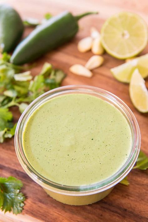 This is one of my "I want to put it on everything sauces" and it's based off a wildly popular green sauce recipe from a Peruvian restaurant in NYC. It only takes 5-10 minutes to make, and is perfect with so many dishes! Green Empanada Sauce, Cilantro Dressing Recipe, Green Sauce Recipe, Cilantro Garlic Sauce, Creamy Cilantro Dressing, Peruvian Chicken, Jalapeno Sauce, Mexican Sauce, Salsa Guacamole