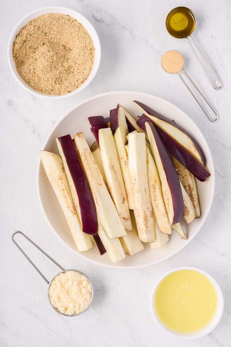 You won't believe how delicious these crispy baked eggplant fries taste! A healthier alternative to traditional fries with a crispy exterior and tender interior. #sidedish #freezerfriendly #kidfriendly #quickandeasy Crispy Baked Eggplant, Baked Eggplant Fries, French Fry Recipe Baked, Eggplant Fries, Burger Side Dishes, Healthy Eggplant, Slender Kitchen, French Fries Recipe, Healthy Appetizer Recipes