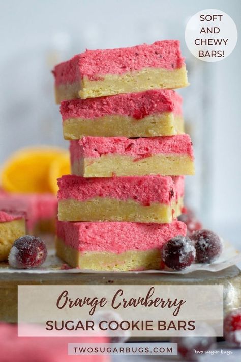 These orange cranberry sugar cookie bars are a great addition to holiday cookie trays! The soft and chewy orange sugar cookie bars are frosted with an easy cranberry buttercream. It's a popular favorite for the Christmas season! ~ Recipe on twosugarbugs.com #orangecranberry #sugarcookiebars #cranberrybuttercream Cranberry Buttercream, Orange Bars, Bar Desserts, Cookie Dough Bars, Winter Baking, Sugar Cookie Mix, Cranberry Cream Cheese, Orange Cranberry, Chewy Sugar Cookies