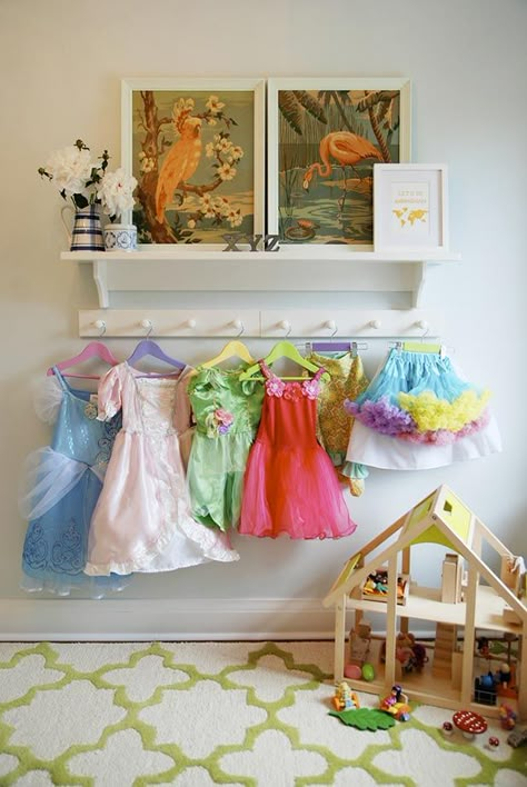 hanging dress up clothes on hooks Dress Up Wall, Dress Up Corner, Dress Up Area, Dresses Hanging, Dress Up Storage, Dress Up Clothes, Girls Playroom, Big Girl Bedrooms, Princess Room