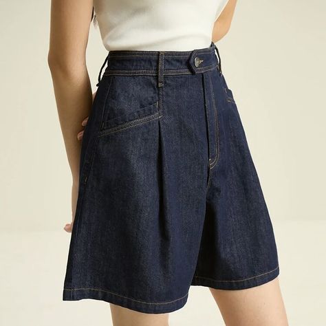 Upgrade Your Summer Style with Dark Denim Blue High Waist Loose Shorts Elevate your summer wardrobe with our newest arrival – the Dark Denim Blue High Waist Loose Shorts. Designed with both comfort and style in mind, these shorts are perfect for the modern woman who craves effortless elegance. Product Features: Retro Pleated Design: Adds a touch of vintage charm to your look. High Waist Fit: Flatters your figure and accentuates your curves. Loose Cut: Provides ultimate comfort for all-day wear. Button Fly Closure: Ensures a secure fit without sacrificing style. Durable Denim Fabric: Made with a blend of cotton, polyester, and regenerated cellulose for long-lasting quality. Benefits: Effortless Style: Transition seamlessly from casual outings to more formal occasions. All-Day Comfort: Stay Paris Vibe, Women Shorts, Effortless Elegance, Loose Shorts, Long Shorts, Retro Stil, Staple Pieces, Outerwear Coats, Dark Denim