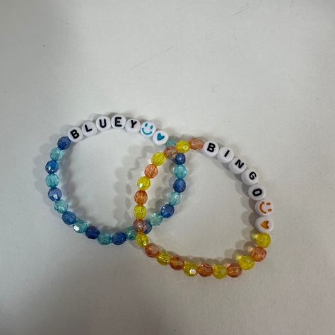 This Is A Handmade Cute Bluey And Bingo Bracelet! This Bracelet Would Be Perfect For Siblings! This Bracelet Is Made Using Elastic String So It Can Fit Almost Any Size Kids' Wrist. This Bracelet Would Be Perfect To Wear With Anything At Anytime! Bundles And Reasonable Offers Welcome! Bluey, Bingo, Matching, Sisters, Matching Bracelets, Cartoon, Bluey Cartoon, Cartoon Show, Cute, Cutesy, Girly, Shiny, Iridescent, Colorful, Multicolored, Amazing, Spring, Summer, Winter, Fall, Every Day, Casual, Si Bluey And Bingo Bracelets, Bluey Gift Ideas, Cartoon Bracelet Ideas, Bluey Bracelet Ideas, Bluey Bracelets, Matching Bead Bracelets, Matching Bracelet Ideas, Bracelet Ideas Beads, Diy Bluey