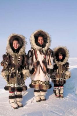 Inuit, Inupiat, and Yupik people, called Eskimos by 19th century Europeans, are the original inhabitants of the Arctic tundra of northern Canada, Alaska, Russia and Greenland. About 100,000 of them still live there. They were nomadic hunter-gatherers and lived near the coast in summer, building up food reserves for the winter. The rest of the year, they travelled hunting caribou, seals, polar bears, and whales...(click to see more). Inuit Clothing, Native Clothing, Urs Polar, Inuit People, Northern Canada, We Are The World, Cultural Diversity, Fur Coats, Folk Costume