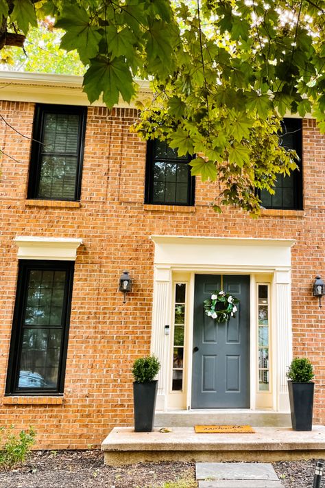 Orange Brick Black Shutters, Black Windows Colonial House, Updated Colonial Exterior Brick, Black Windows On Brick House, Black Windows Brick House, Red Brick House With Black Windows, Red Brick Colonial House, Brick House Black Windows, Brick House With Black Windows