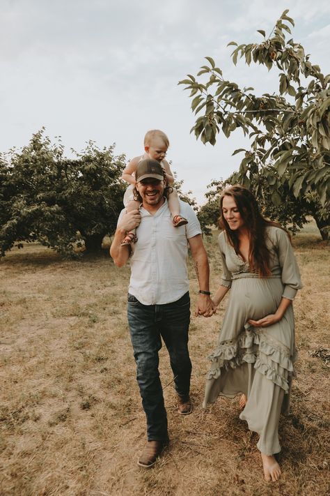 Maternity photo cherry orchard photoshoot Family photos Pregnancy With Toddler Photoshoot, Orchard Maternity Photoshoot, Apple Orchard Maternity Photoshoot, Green Maternity Dress Photoshoot Family, Orchard Family Photos, Apple Orchard Maternity Photos, Fall Maternity Photoshoot With Toddler, Orchard Photoshoot, Green Maternity Dress Photoshoot