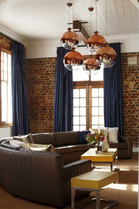 love how they took the curtains almost to the ceiling to allow the eye to realize just how tall the room is. living_room_2_with_old_raw_brick_walls Rooms Curtains, Blue Curtains Living Room, Dark Blue Curtains, Brick Wall Living Room, Brick Living Room, Brick Room, Curtains Design, Living Room Decor Tips, Dark Blue Living Room