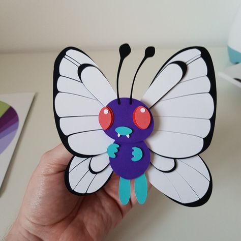 A handmade Butterfree pokemon piece, as part of a larger custom wall art order at Crafting Clever on Etsy - custom orders always welcome! Butterfree Pokemon, Perspective Shots, Paper Craft Greeting Cards, Papercut Art, Pokemon Gif, Ideas Craft, Craft Artists, Paper Cut Art, Custom Wall Art