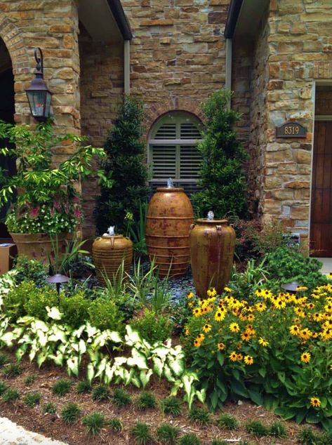 Garden fountains add a wonderful element to your landscape with visual appeal and noise pollution reduction with the tranquil sound of water. Tuscan Landscape Design, Mediterranean Landscape Design, Courtyard Landscaping, Tuscan Landscaping, Front Yard Design, Mediterranean Landscaping, Decor Ikea, Rock Garden Landscaping, Landscape Plans