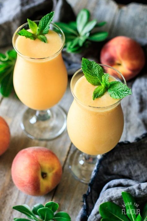 Virgin Peach Daiquiri: this refreshing non alcoholic summer drink is the perfect treat for kids, teens, and adults. This easy mocktail is made with fresh peaches, simple syrup, rum extract, and ice, plus a garnish of mint. It’s a great way to enjoy fresh peaches while they’re in season! | www.savortheflavour.com #freshpeaches #peachseason #daiquiri #mocktail #nonalcoholic Non Alcoholic Daiquiri, Summer Drinks Nonalcoholic, Peach Daiquiri, Rum Extract, Coctails Recipes, Summer Drinks Alcohol, Drink Recipes Nonalcoholic, Alcoholic Cocktails, Refreshing Summer Drinks