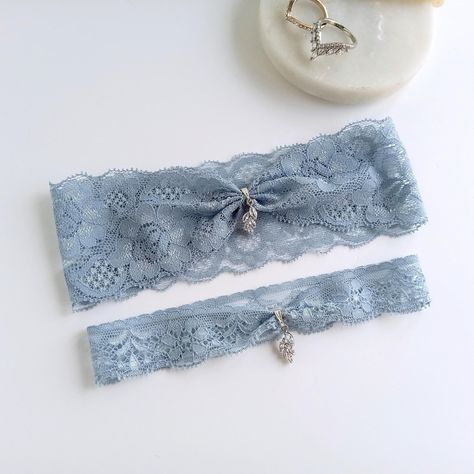 Gorgeous silver or gold custom sized lace Wedding garter set, made with high quality glass crystal rhinestones and stretch lace in dusty blue or the color you choose.  MEASURING INSTRUCTIONS: Use a soft tape measure or string and ruler. Measure where you want to wear your keepsake garter and order your actual measurement. I will take some off so it stretches to fit. Your toss garter will be made smaller than the keepsake. SHIPPING: Each item is custom handmade to order and will ship out 3-5 busi Something Blue Garter, Something Blue Ideas, Garters For Wedding, Wedding Something Blue, Lace Wedding Garter Set, Wedding Accessories For Bride, Bride Garter, Wedding Garter Blue, Wedding Garter Lace