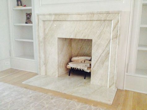 Quartzite Fireplace, Cream Fireplace, Taj Mahal Quartzite Countertops, Beige Backsplash, Granite Fireplace, Taj Mahal Quartzite, Marble Fireplace Surround, Brown Floors, Custom Fireplace