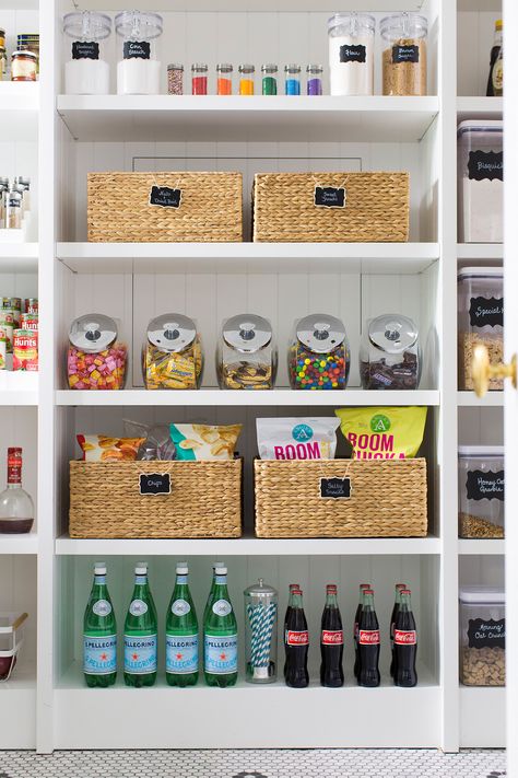 Chip bags can be a hassle to corral so store them in a structured, rectangular basket, Ruff says. "Not only will this keep the bags from slipping off the shelf, but it will also protect the chips from being crushed." #marthastewart #organization #kitchentips Neat Method, Organized Pantry, Rectangular Baskets, The Home Edit, Pantry Shelf, Pantry Design, Pantry Storage, Container Store, Glass Storage