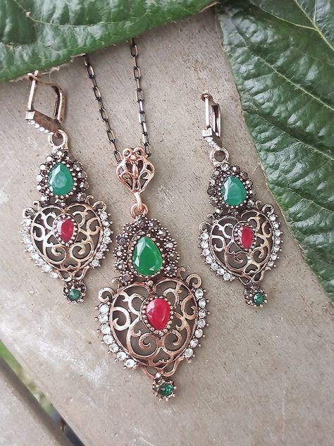 Authentic Turkish Jewelry Set Earrings Necklace Unique Vintage Design Ottoman Style MIHRIMAH SULTAN Hurrem Sultan Magnificent Century A beautiful and stylish accessory! Authentic and unique Turkish design. Ottoman-style vintage jewelry that will make you feel like real Sultana from Ottoman Dynasty. Named after The Great MIHRIMAH Sultan, the jewelry set is coming in three colors (based by main middle stone): Blue Red Green Necklace: Adjustable long chain Earrings: stud Details: crystal, resin, An Turkish Gold Jewelry, Mihrimah Sultan, Hurrem Sultan, Long Chain Earrings, Ottoman Styling, Turkish Design, Crystal Resin, Set Earrings, Magnificent Century