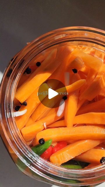 Uthika Naidu on Instagram: "Vinegar Carrots, as I fondly call it ❤️ 

An accompaniment to curries, bunnies, biryanis.. It was something I could eat a bowl of while studying for matric exams. Similar to mango pickle, this pickle was probably found it most South African Indian homes and its sour, crunchy qualities made it incredibly addictive!

There are so many different ways to make it. Here is mine : 

Ingredients: 

1kg carrots (chopped into batons)
1 large onion/ pickle onions
500g mixed chillies (or chillies of your choice)
1.5 liters white spirit vinegar
3 tsp whole black pepper corns
3 bay leaves
1/3 cup sugar (unfortunately cut out of my video 😪)
Salt to taste
A cleaned glass jar 

Method : 

1. Heat up the vinegar and add the spices, sugar and salt. Infuse for about 5 minutes. It Vinegar Carrots, Pickle Onions, Onion Pickle, Mango Pickle, Pickled Carrots, Pickled Veggies, White Spirit, Pickle Jars, Indian Homes