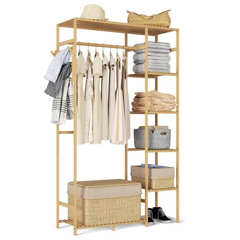 PRICES MAY VARY. Multifunctional Storage Rack: The multi storage hanging rack can be used as an open closet to organize clothes, or as a clothes drying rack or a plant rack. Its compact design makes it attractive in the living room, entryway, kid's room, bedroom, small apartment or dorm. 100% Nature Bamboo: This hanging garment rack is made of natural bamboo, durable and non-deformable, environmentally friendly and safe for your family. Use natural paint to avoid rusting and make the surface and Organize Clothes, Plant Rack, Natural Paint, Closet Rack, Pants Rack, Storage Hanging, Hanging Clothes Racks, Heavy Duty Clothes Rack, Open Closet