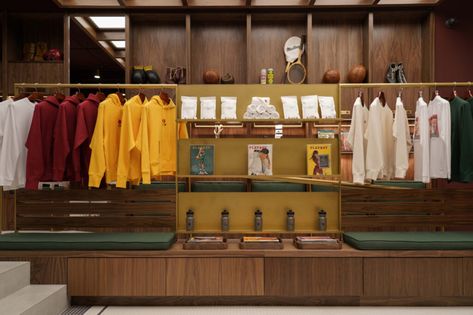 CONTACT SPORTS UNVEILS A GAME-CHANGING RETAIL EXPERIENCE IN SOHO - MR Magazine Sports Shop Interior Design, Olympic Podium, Store Experience, Sporting Goods Store, Retail Boutique, Tennis Club, Retail Experience, Clothing Retail, Design Image