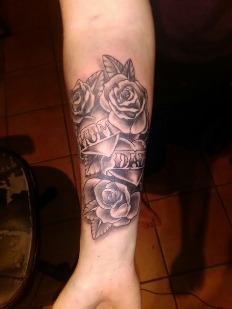 Mum And Dad Rose tattoo forearm Tattoo Rose Forearm, Mom Memorial Tattoo Ideas For Daughter Forearm, Parents Name Tattoos Ideas For Women, Tattoos For Mum And Dad, Mum And Dad Tattoos Men, Mum Dad Tattoos, Mum And Dad Tattoos For Women, Mum Tattoo For Men, Tattoo For Mum