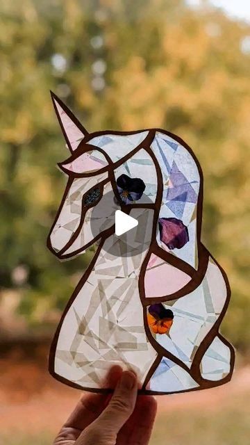 Crystal // nature arts and crafts on Instagram: "Unicorn suncatcher 🦄  who else finds suncatchers enchanting? To make your own, you'll need:

- Kraft paper

- tissue paper

- dried and pressed flowers

- clear contact paper

- box cutter

To create, I drew a unicorn image onto the Kraft paper and then cut it out using a box cutter. Line the back of the stencil with a piece of contact paper, and trim the edges. All that's left is to decorate as you please and admire your handy work!

.

.

.

.

.

#naturecrafts #natureplaymothers #natureplayideas #cardboardcrafts #cardboardcreations #suncatcher #tissuepaperart #kidscraftideas #kidscrafts101 #kidscreate #kidscreativity #bastelnmitkindern #completementcraft #recycledcraft #recyclemeplay #cardboardcrafts #papercrafts #howtomake #walkthrough Unicorn Suncatcher, Nature Arts And Crafts, Art Camp Projects, Camp Projects, Tissue Paper Art, Unicorn Images, T Craft, Art Camp, Dried And Pressed Flowers