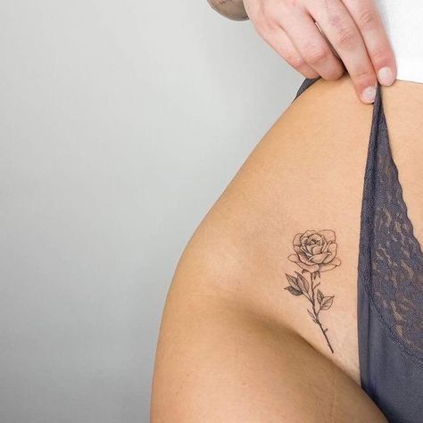 Small Rose Tattoo On Back, Fine Line Rose Tattoo With Writing, Women’s Rose Tattoo, Rose Hip Tattoos Women, Fine Line Rose Bouquet Tattoo, Small Rose Hip Tattoo, Hip Rose Tattoos Women, Fineline Hip Tattoo, Small Fineline Tattoos For Women