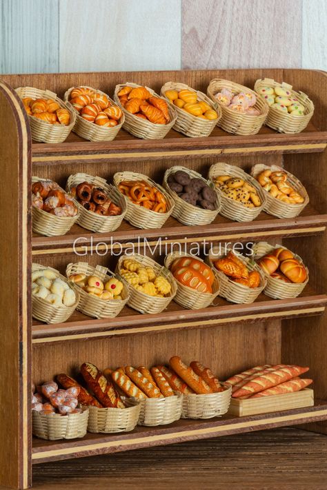 "This listing totally have the following items: - 268 pieces of miniatures bakery and pastry (as stated in the product image). - 23 pieces of miniatures container. - 1 piece of miniatures shelf. Shelf wasn't based on any dollhouse scale, made of plywood, wood preserved oil coated. All other elements were mostly 1:12 dollhouse scale, made of clay, wood and bamboo. Approximate size of shelf is 2 3/8\" x 9\" x 8\", width, length and height respectively. Please be noted that all elements weren't glu Miniature Bakery Diy, Bakery Decor Ideas, Mini Bakery Shop Design, Mini Bakery Shop, Bakery Dollhouse, Bakery Miniature, Clay Bakery, Tiny Bakery, Dollhouse Bakery