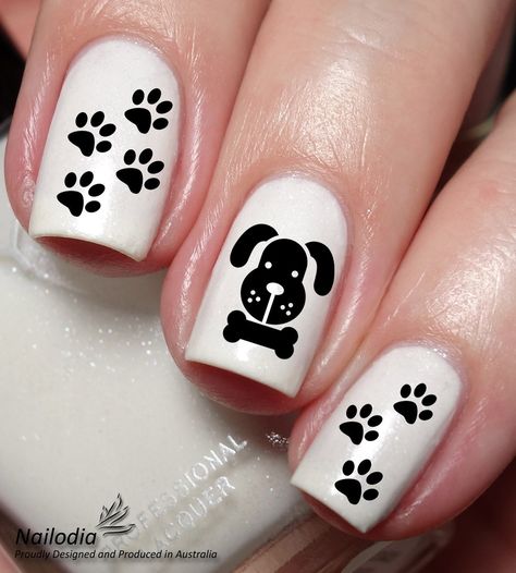 The Package Includes: 1. Dog paw Nail Art Sticker (22 Decals per sheet) 2. Instruction You will recieve exactly what you see on the last image of the item. These lovely decals can be applied over any colour and any type of nails such as regular polish, soak off gel, hard gel and acrylic. To check the size of each decal, please see the last image of the item. Easy to apply: 1. Trim, clean and paint your nails in the colour of your choice. 2. Cut the patterns in your desired size in order to fit o Paw Nail Art, Type Of Nails, Paw Print Nails, Dog Nail Art, Animal Nail Designs, Paw Nails, Animal Nail Art, Heart Nail Art, Animal Nails