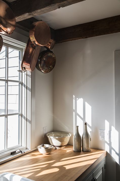 Additional hanging storage, courtesy of iron wall hooks affixed to the rafters. Esteves’ mother uses them to display copper pots and pans. Minimalist Kitchen Design, Casa Vintage, Minimalist Interior Design, Farmhouse Style Kitchen, Modern Farmhouse Kitchens, Minimalist Home Decor, Minimalist Kitchen, Rustic Interiors, Minimalist Interior