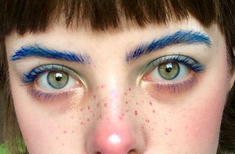 Blue brows green eyes red nose freckles rainbow Blue Freckles Makeup, Colourful Eyebrows, Red Nose Makeup, Clown Aesthetic Makeup, Rainbow Freckles Tattoo, Red And Green Makeup, Colorful Freckles, Aesthetic Freckles, Rainbow Freckles