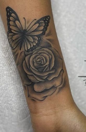 Tattoo Ideas Female Black Women Arm, Medium Wrist Tattoos, Butterfly Tattoos For Women Arm, Butterfly Wrist Tattoos For Women, Flower With Butterfly Tattoo, Tattoo Ideas Female Meaningful Unique Arm, Rose And Butterfly Tattoo Design, Female Wrist Tattoos, Tattoo Ideas Female Wrist