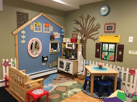 Check out the chimney and the picket fence... soooo cute! #preschool Home Daycare Ideas, Daycare Rooms, Daycare Decor, Preschool Rooms, Dramatic Play Area, Dramatic Play Preschool, Preschool Centers, Church Nursery, Dramatic Play Centers